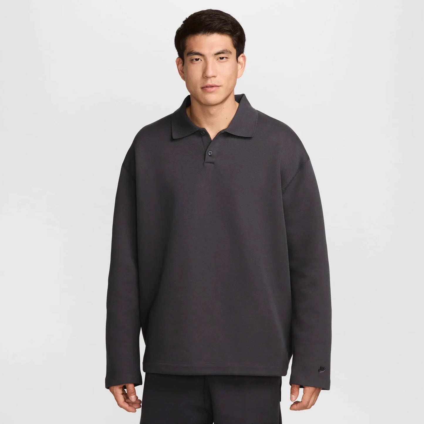 NIKE Tech FLC Polo Oversized in Black