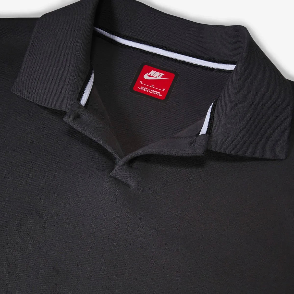NIKE Tech FLC Polo Oversized in Black