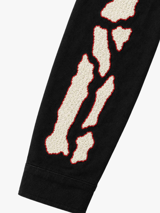 Distressed short work jacket with a terry-cloth skull embroidery